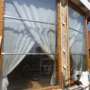 Průběh opravy dřevěných oken pomocí instalace hliníkového pláště na narážecí podložky