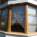 Opravená okna hliníkovým opláštěním s dekorem dřeva