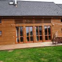 Rodinný dům Český Krumlov, Jihočeský kraj  - po opravě oken hliníkovým opláštění s dekorem dřeva