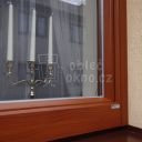 Detail okna po renovaci hliníkovým opláštěním s dekorem dřeva Window servis