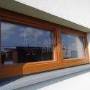 Dřevěné okno po opravě hliníkovým opláštěním s dekorem dřeva firmou Window servis