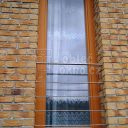 Opravené okno hliníkovým opláštěním s dekorem dřeva